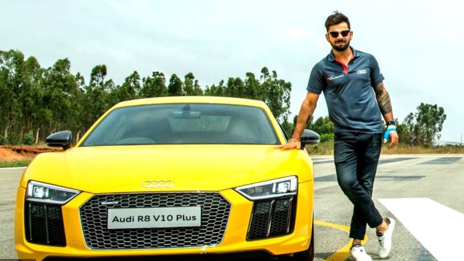 Virat Kholi with his yellow Audi R8 V10 Plus