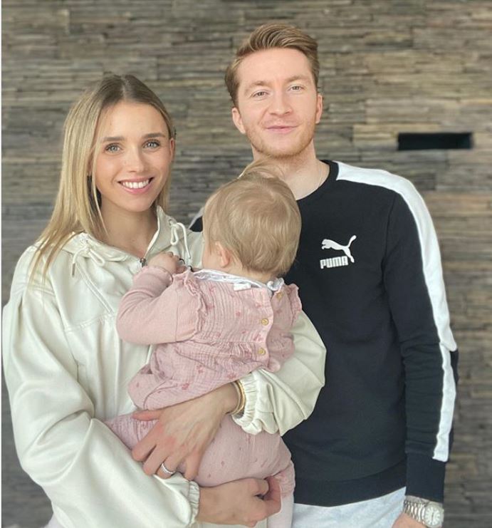 Scarlett and Marco Reus with their Daughter